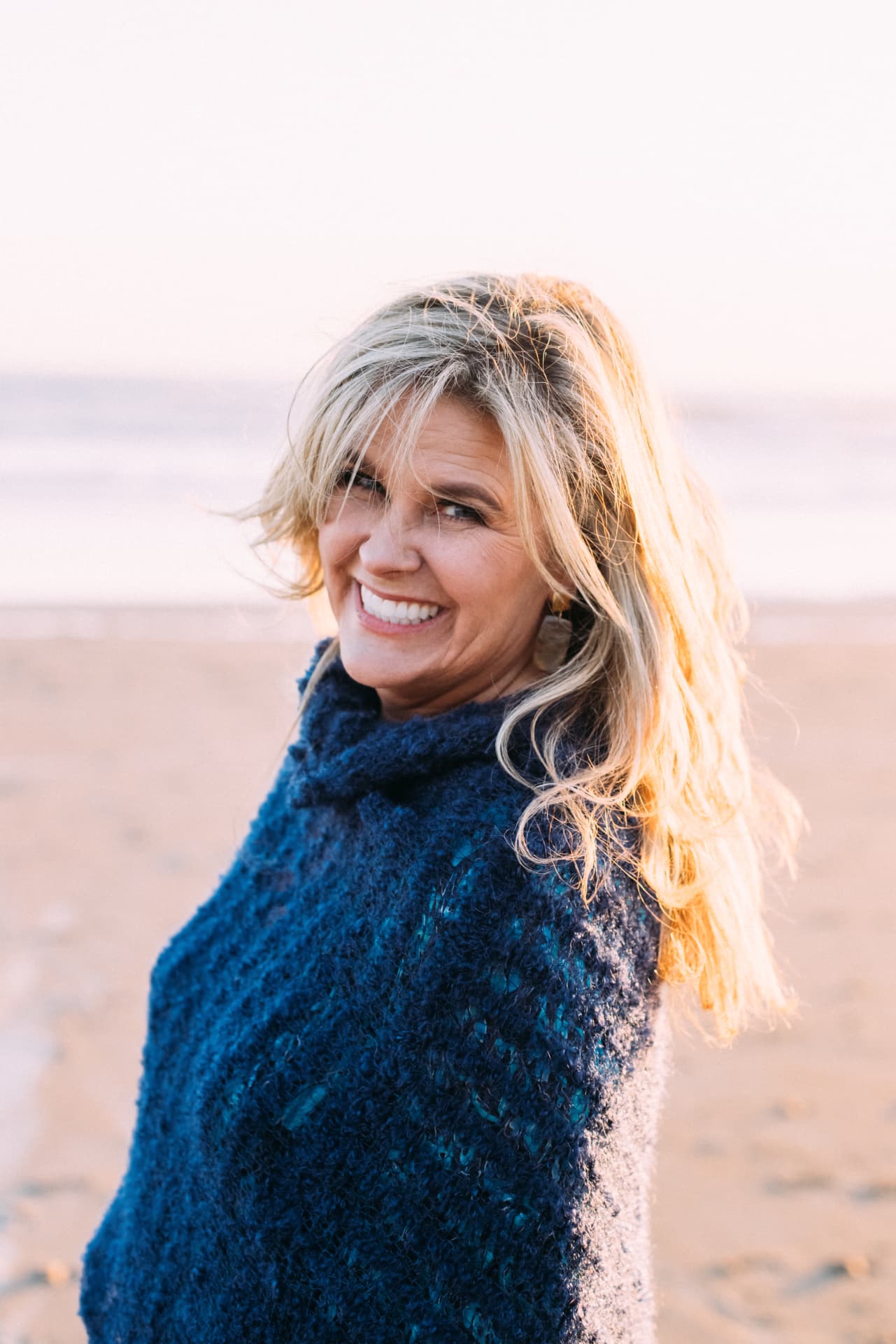 Anne Robie smiling at the beach